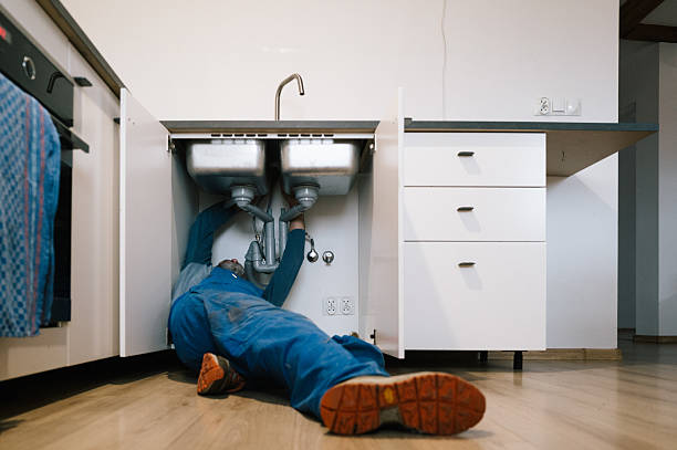 Professional Drain Cleaning technician working in Battery Park, VA